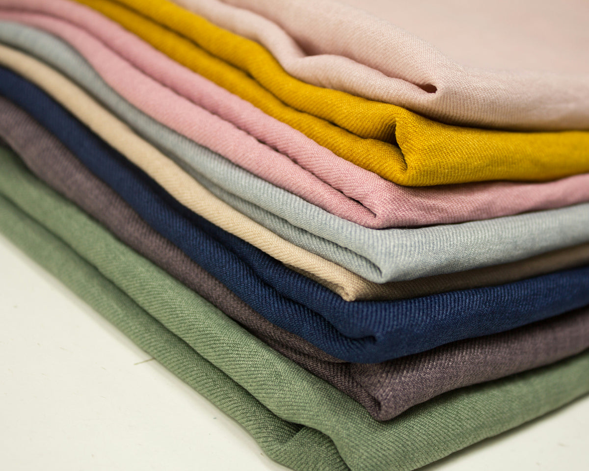 Stacked folded solid colored fabric