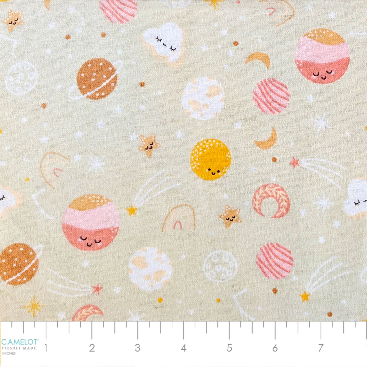 Camelot Fabrics Space Friends pink cotton flannel fabric featuring smiling planets, stars, moons, clouds, and rainbows from the Fleece and Flannel 2026 Collection.