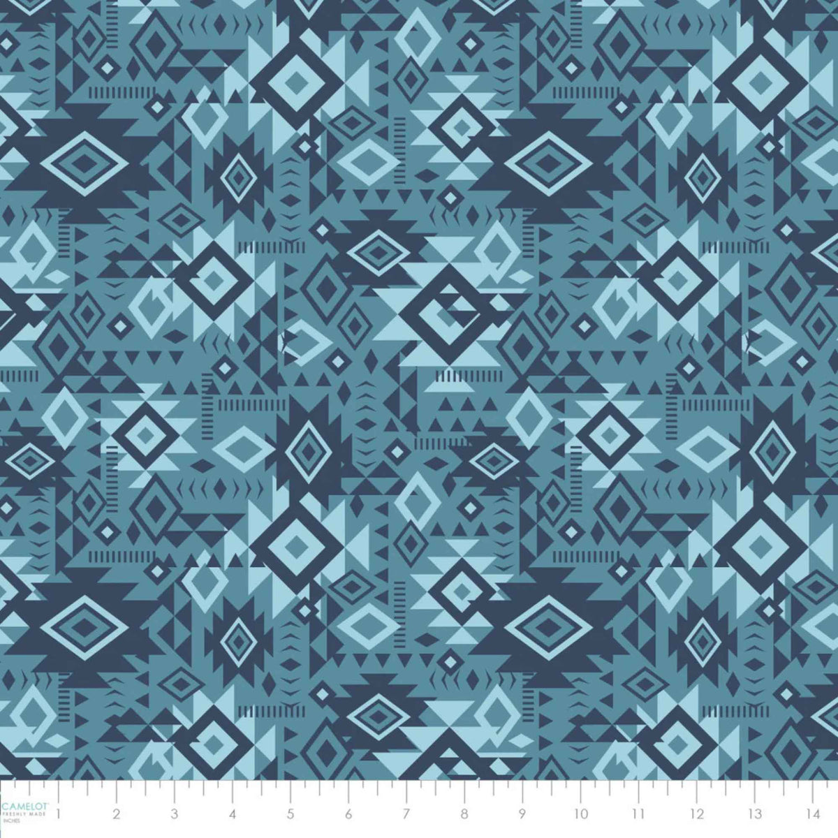 “Denim blue Southwestern geometric cotton fabric with layered Aztec diamond motifs.”