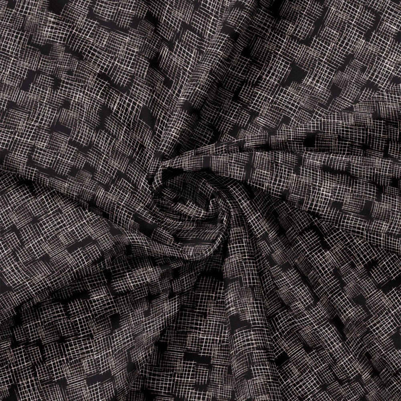 "Etches black cotton fabric with abstract white crosshatch textured design by Camelot Fabrics"