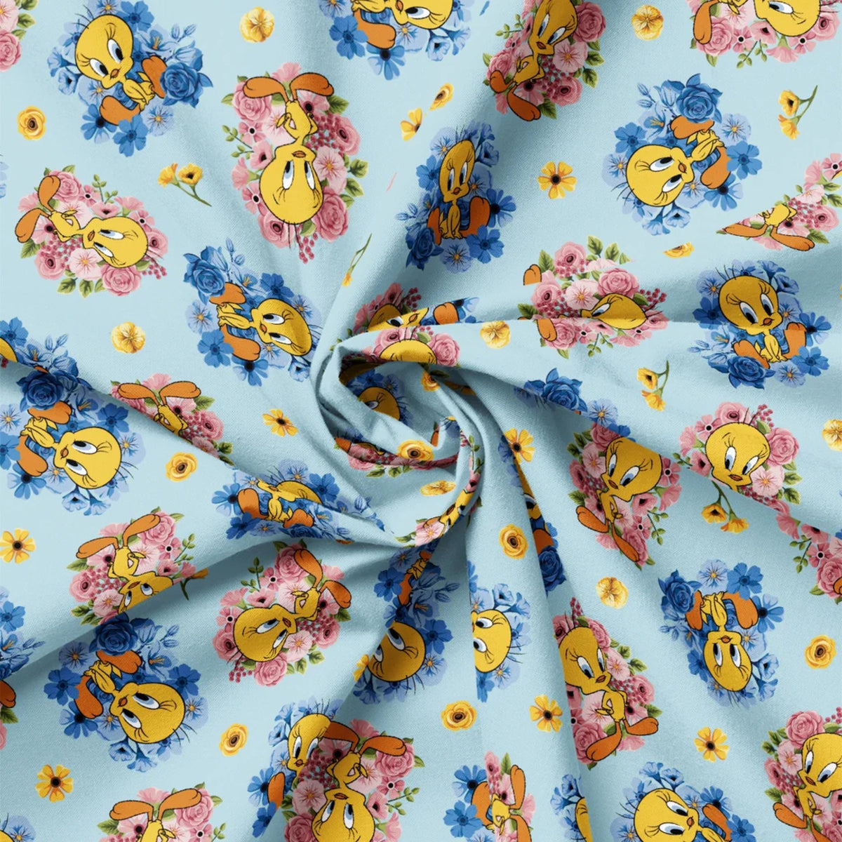 Floral Burst Tweety Blue quilting cotton by Camelot Fabrics featuring Tweety with pink and blue floral bouquets on a soft blue background