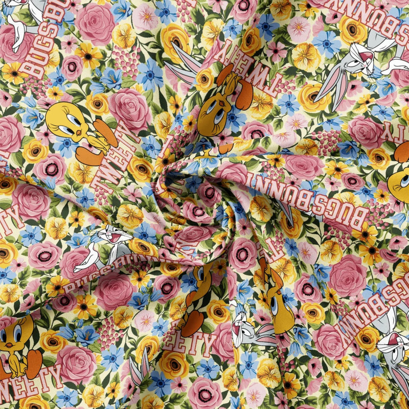Grannycore Looney Tunes Yellow quilting cotton from the Looney Tunes Floral Collection by Camelot Fabrics with colourful vintage-inspired florals