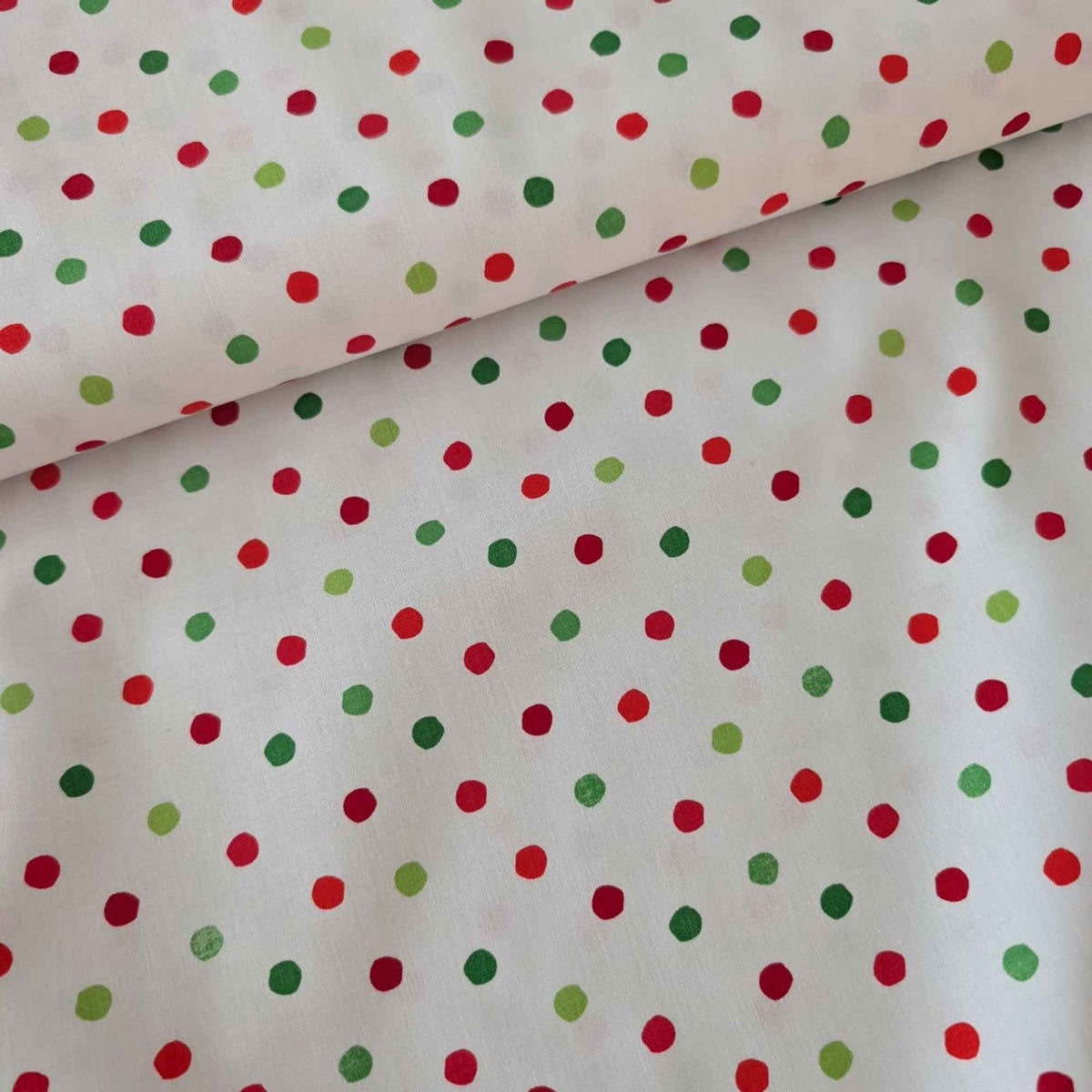 Dr. Seuss Christmas cotton fabric with red, green and lime dots on white by Robert Kaufman