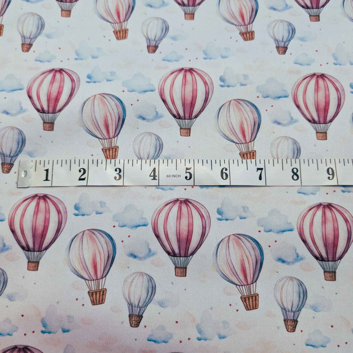 Hot air balloon PUL fabric showing print scale on white waterproof sewing fabric