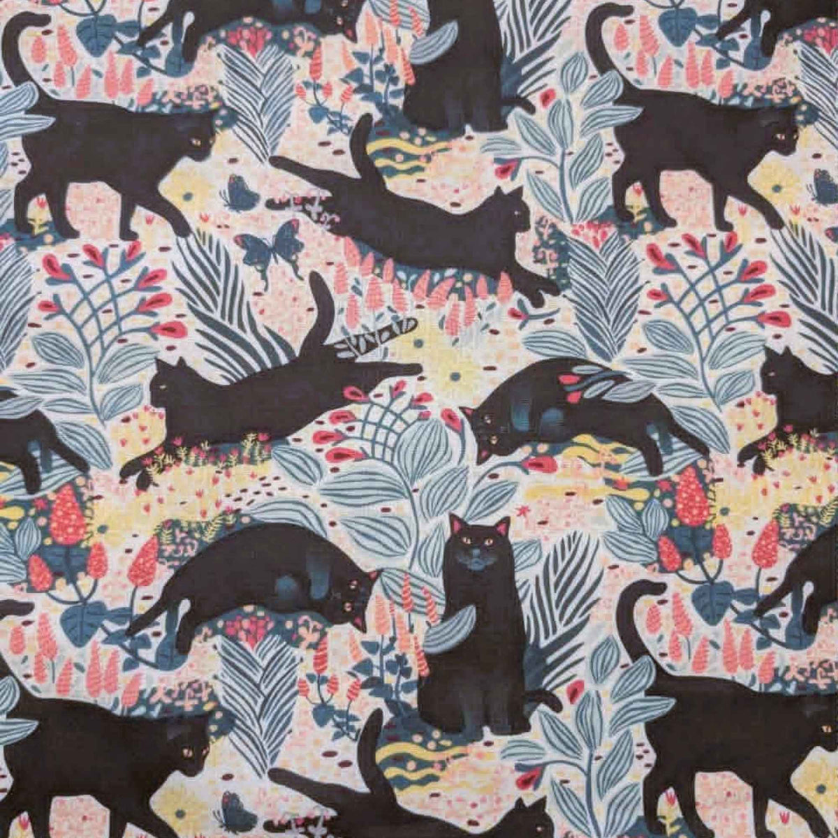 Black cat floral novelty quilting cotton fabric with leaves and butterflies on a light background