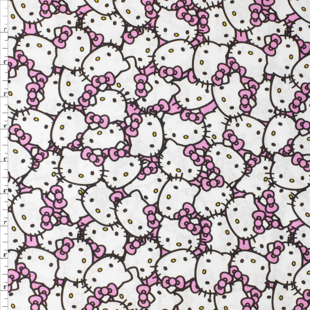 Officially licensed Hello Kitty cotton fabric by Springs Creative featuring an all-over packed print of Hello Kitty faces with pink bows on a soft pink background.