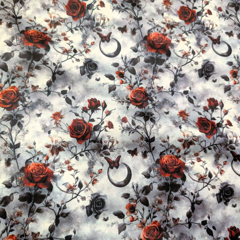Enchanted Moonlit Roses exclusive waterproof PUL fabric with red and black roses, butterflies and crescent moons on a smoky cream background