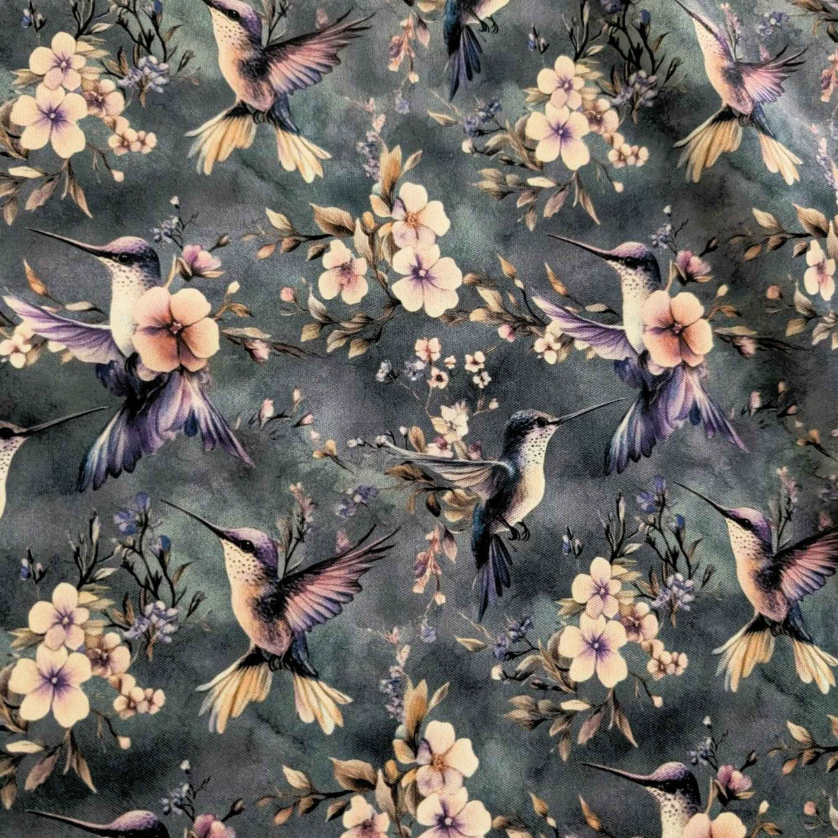 Twilight Hummingbird Garden exclusive waterproof PUL fabric with hummingbirds and soft flowers on a smoky blue-grey background