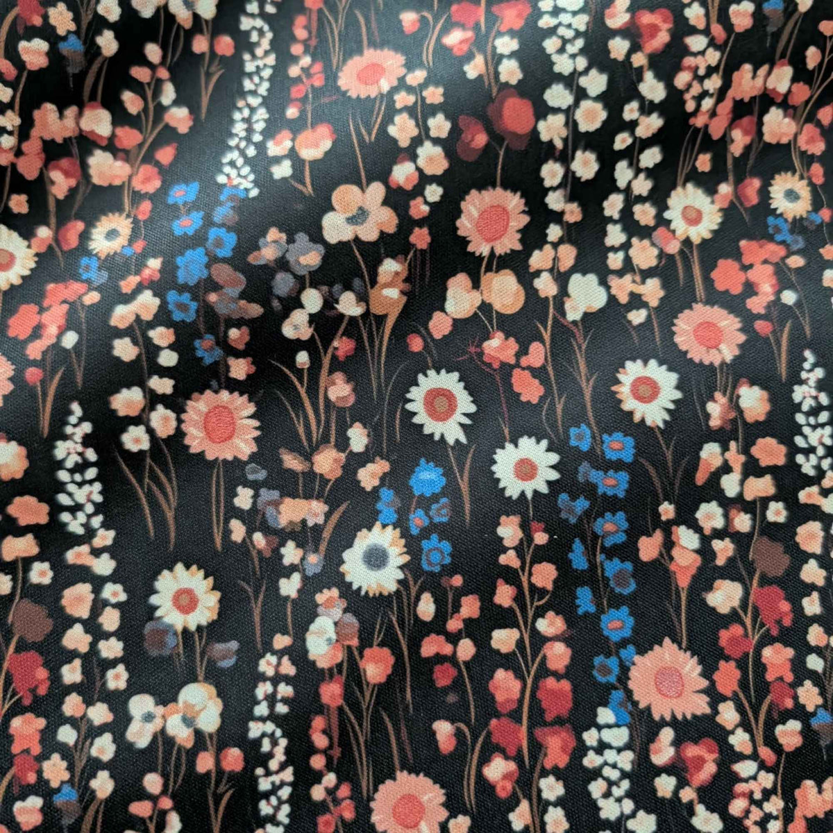 Vintage Wildflower Meadow exclusive waterproof PUL fabric with coral, cream and blue flowers on a black background