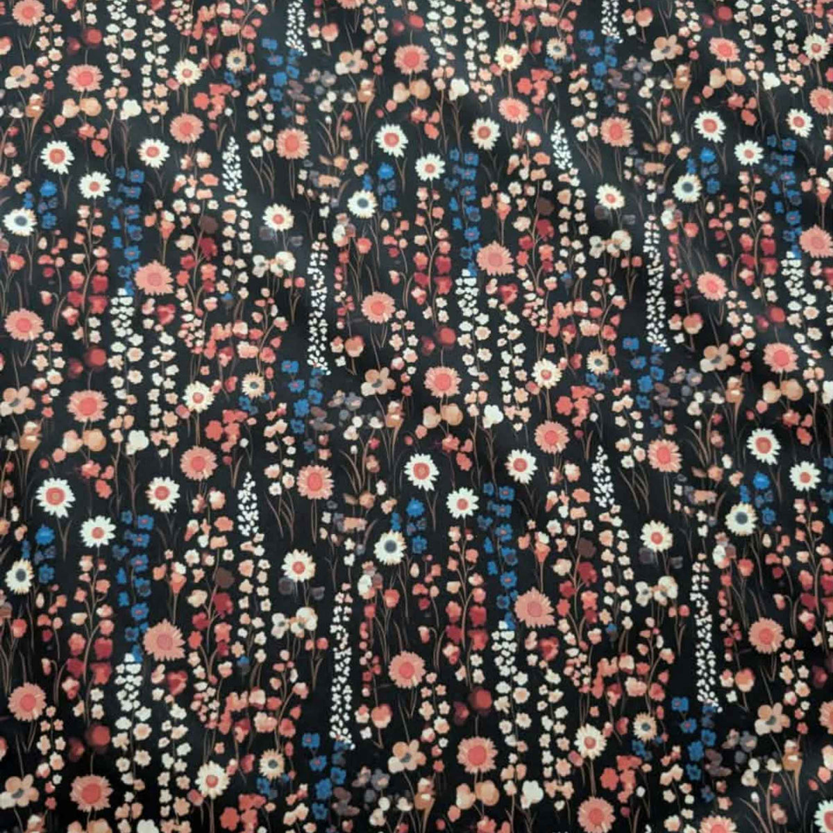 Vintage Wildflower Meadow exclusive waterproof PUL fabric with coral, cream and blue flowers on a black background