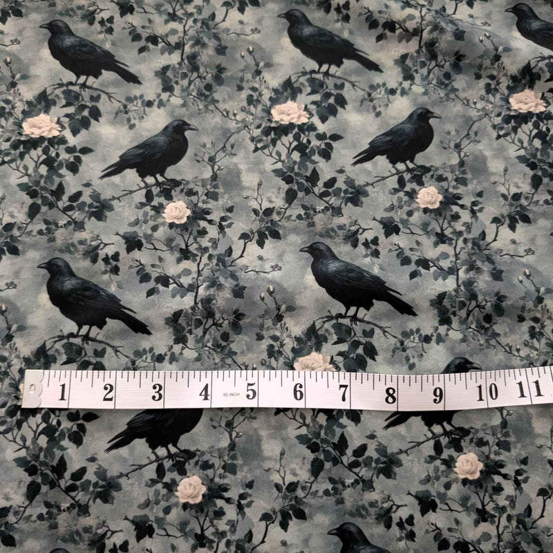 Ravens and Roses in the Mist exclusive waterproof PUL fabric with black ravens, pale roses and branches on a smoky grey background