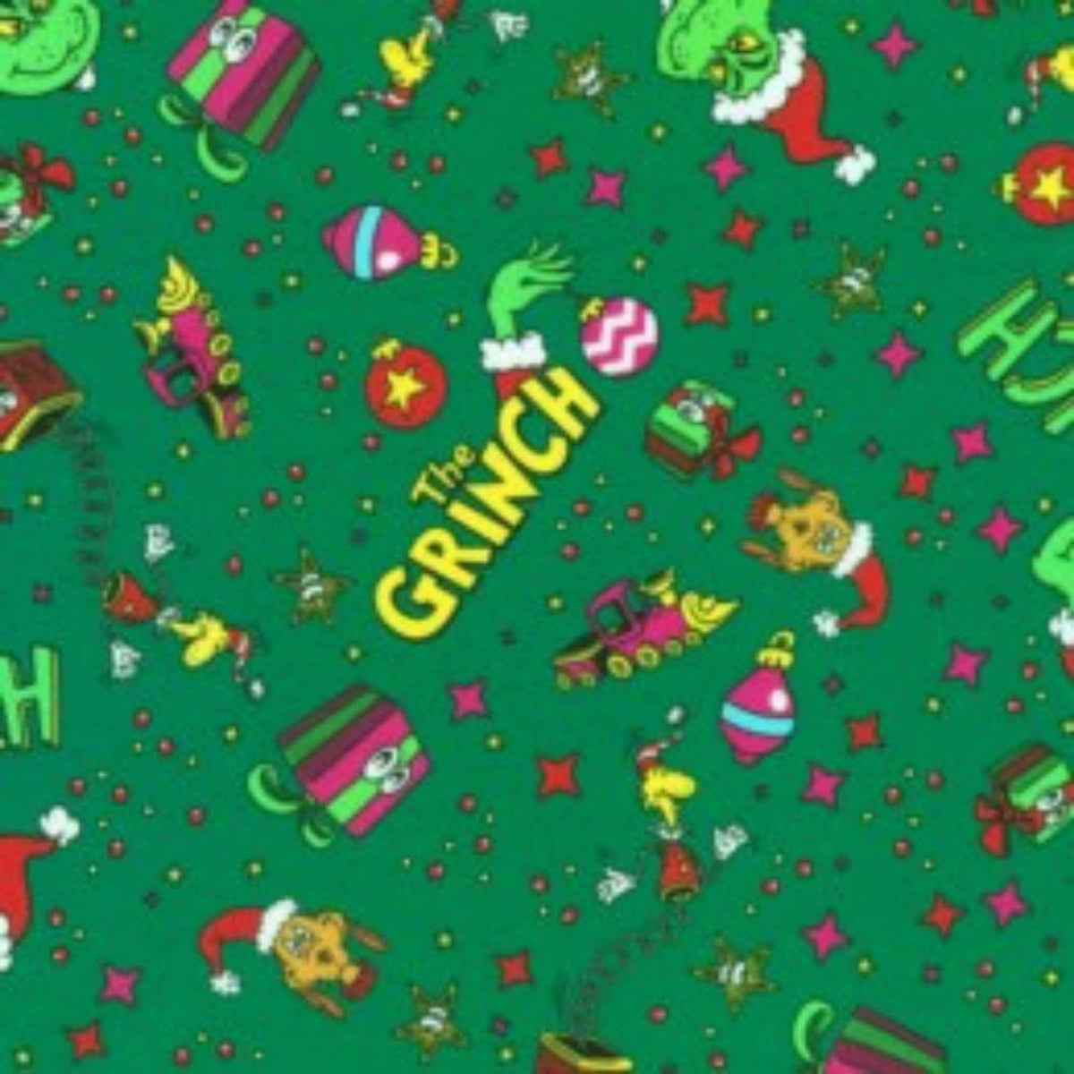 Grinch Toy Toss Christmas cotton fabric on evergreen by Robert Kaufman