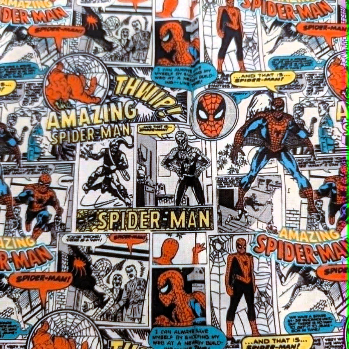 Marvel Amazing Spider-Man vintage comic panel quilting cotton fabric featuring classic comic strips, Spider-Man characters, logos, speech bubbles, and web graphics on a white background.