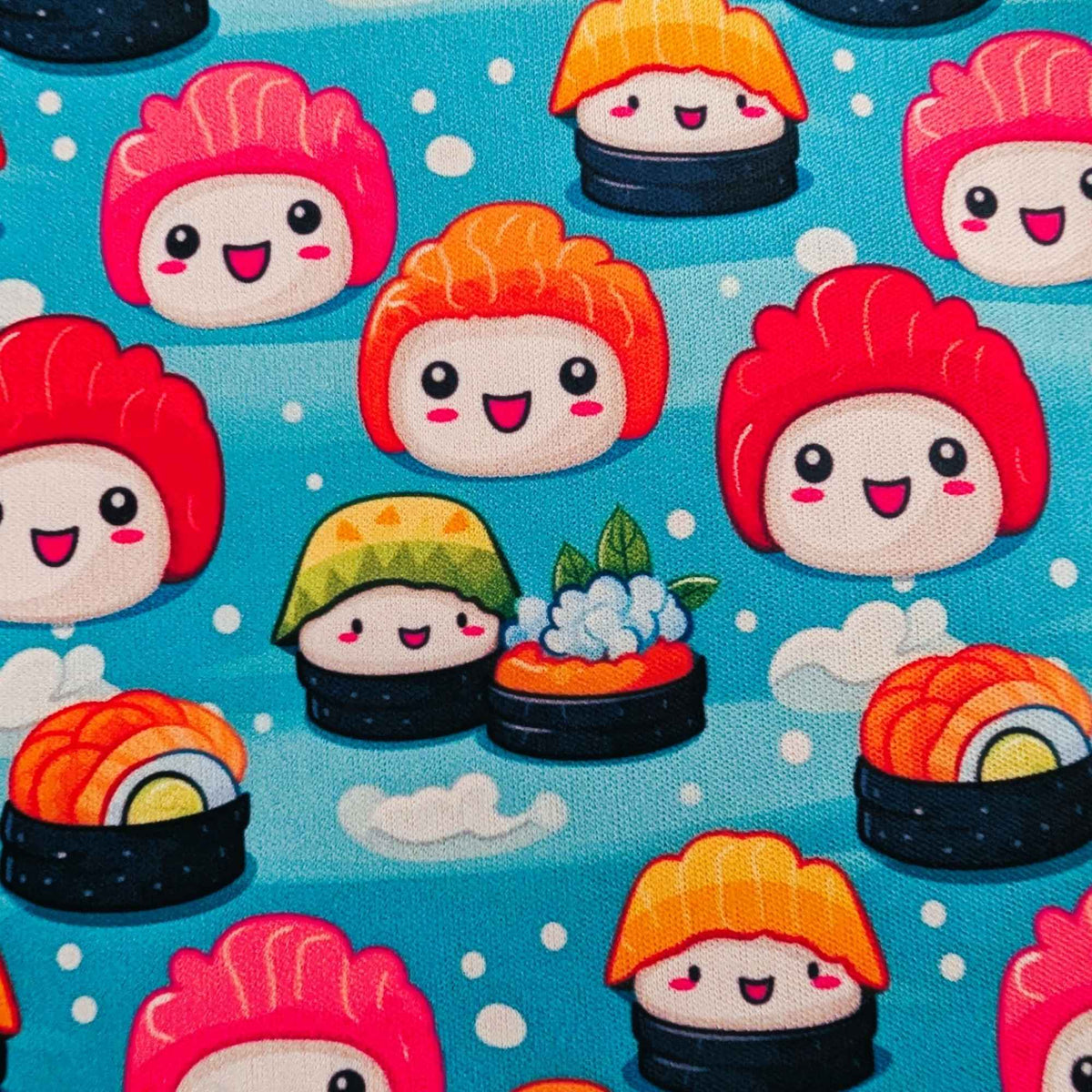 Kawaii Happy Sushi exclusive waterproof PUL fabric with smiling colourful sushi characters and white clouds on an aqua-blue background