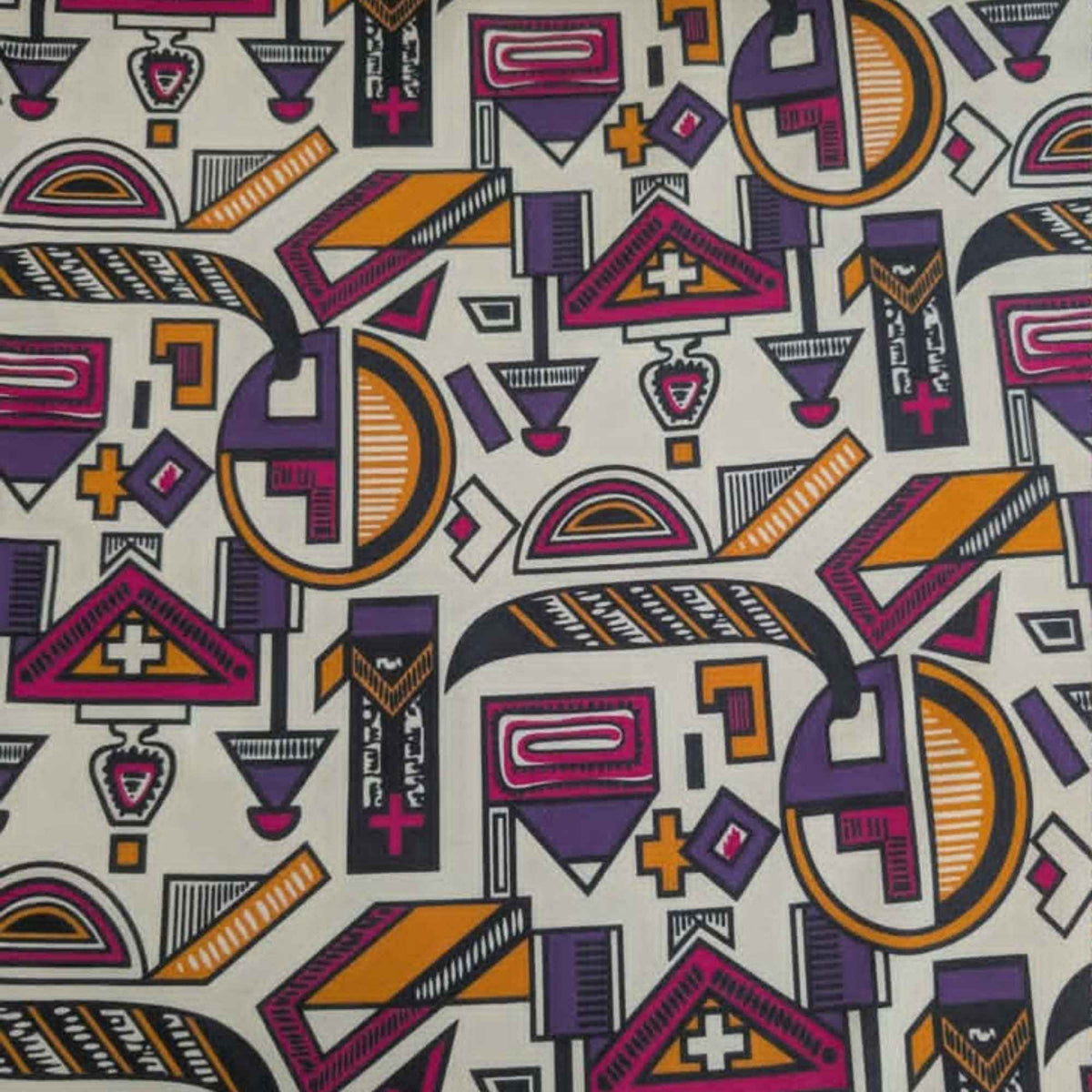 African-inspired geometric tribal double brushed flannel fabric featuring colorful abstract geometric symbols on a cream background.