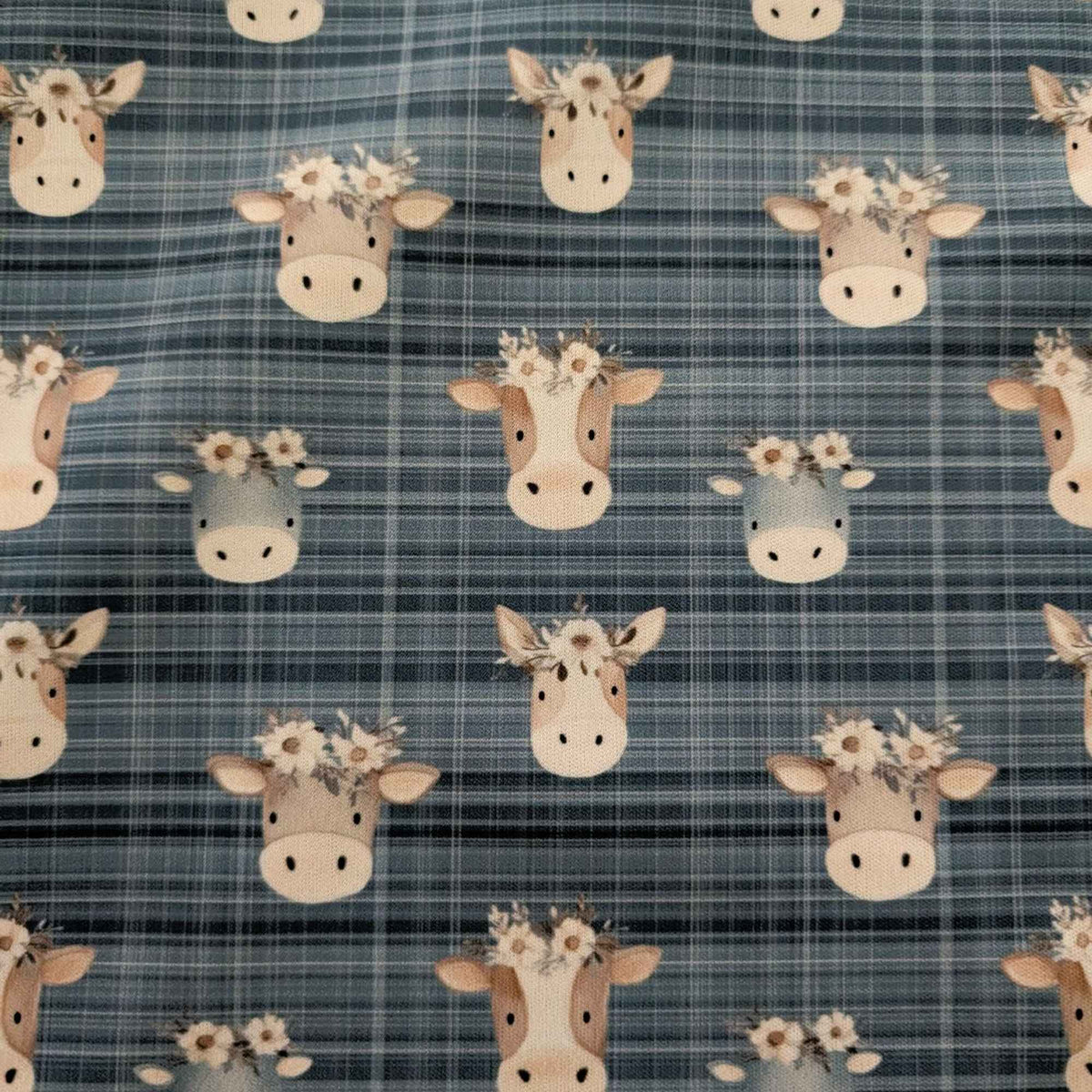Flower Crown Cows on Blue Plaid exclusive waterproof PUL fabric with brown and grey cows wearing white flowers