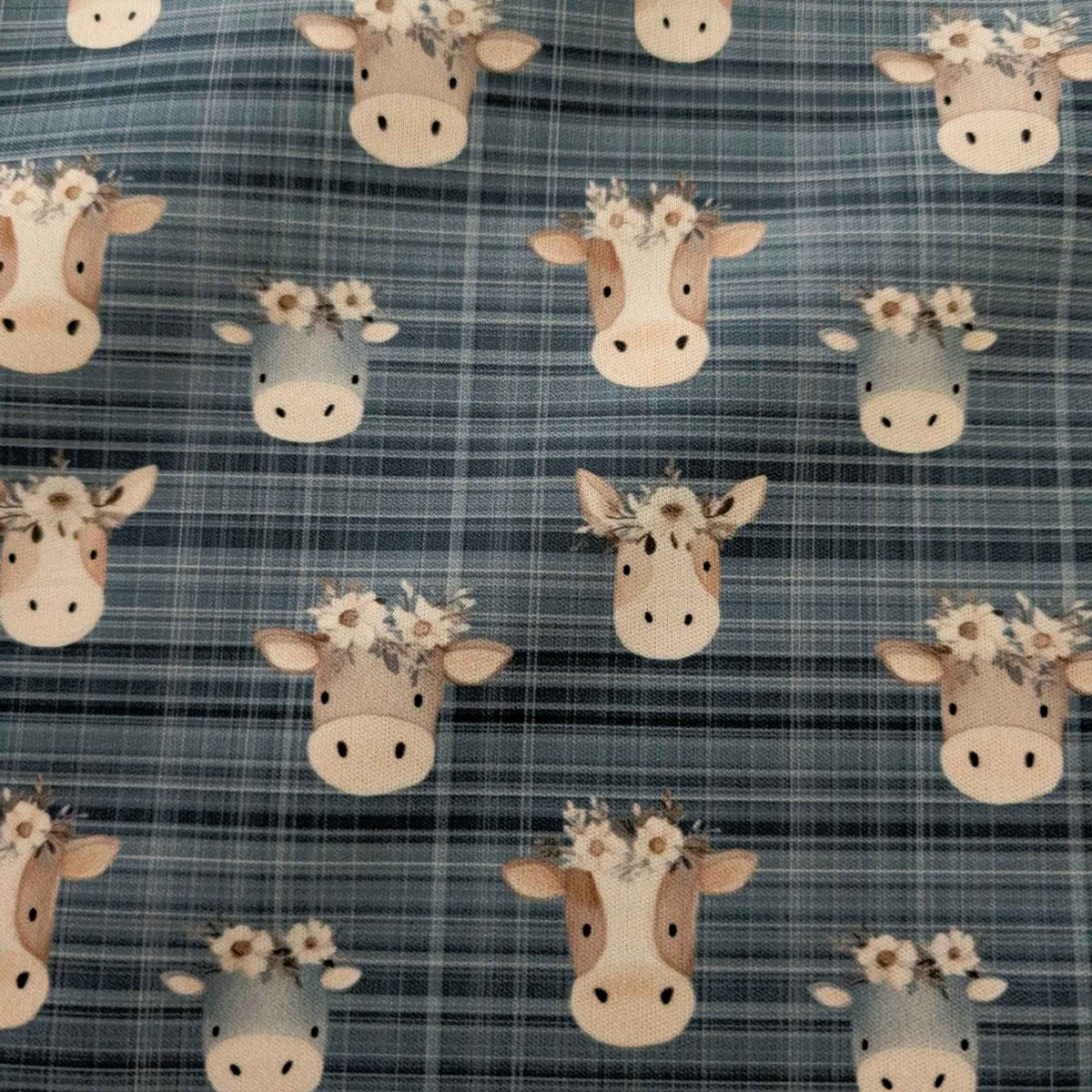 Flower Crown Cows on Blue Plaid exclusive waterproof PUL fabric with brown and grey cows wearing white flowers