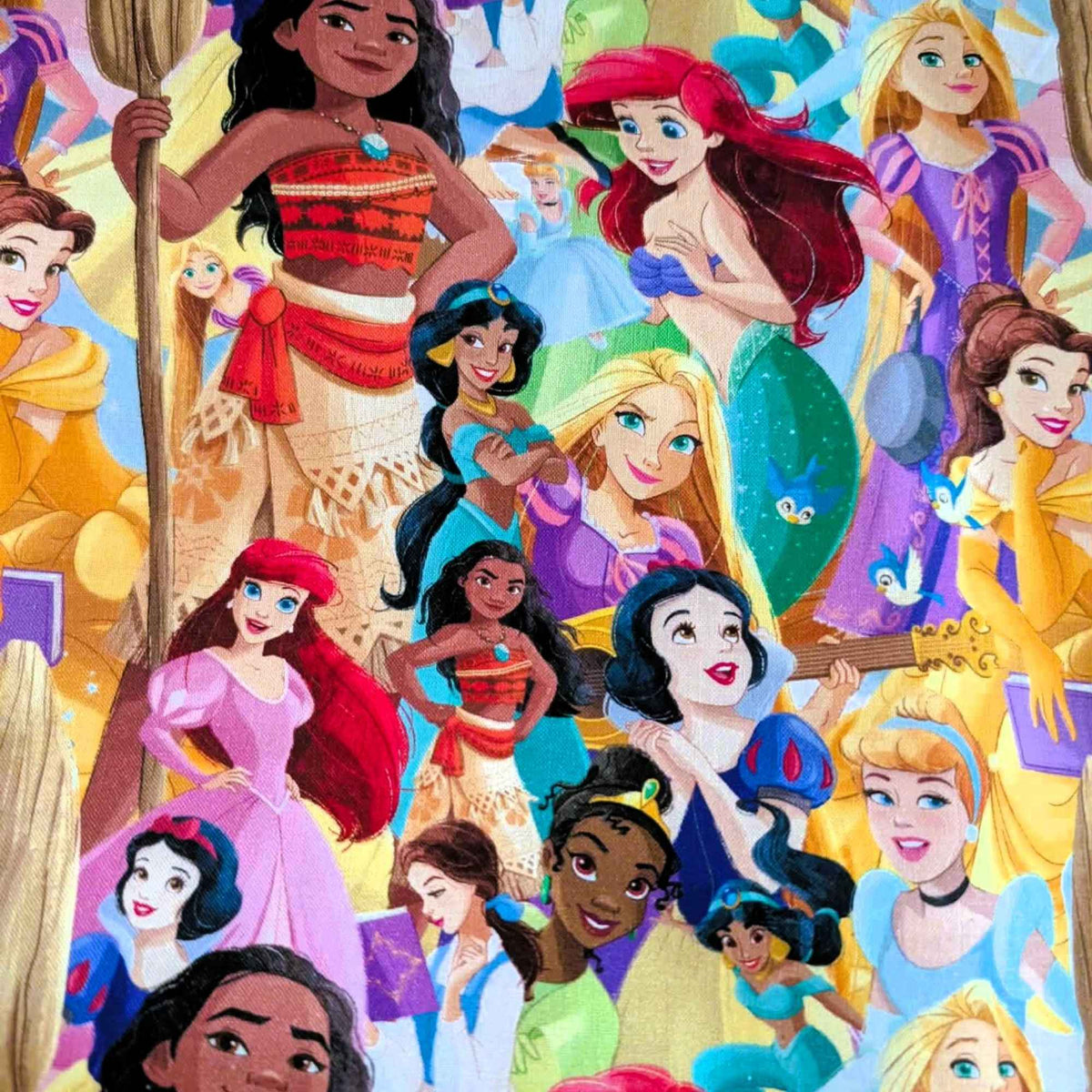 Disney Princess character collage cotton fabric by Springs Creative CP80523