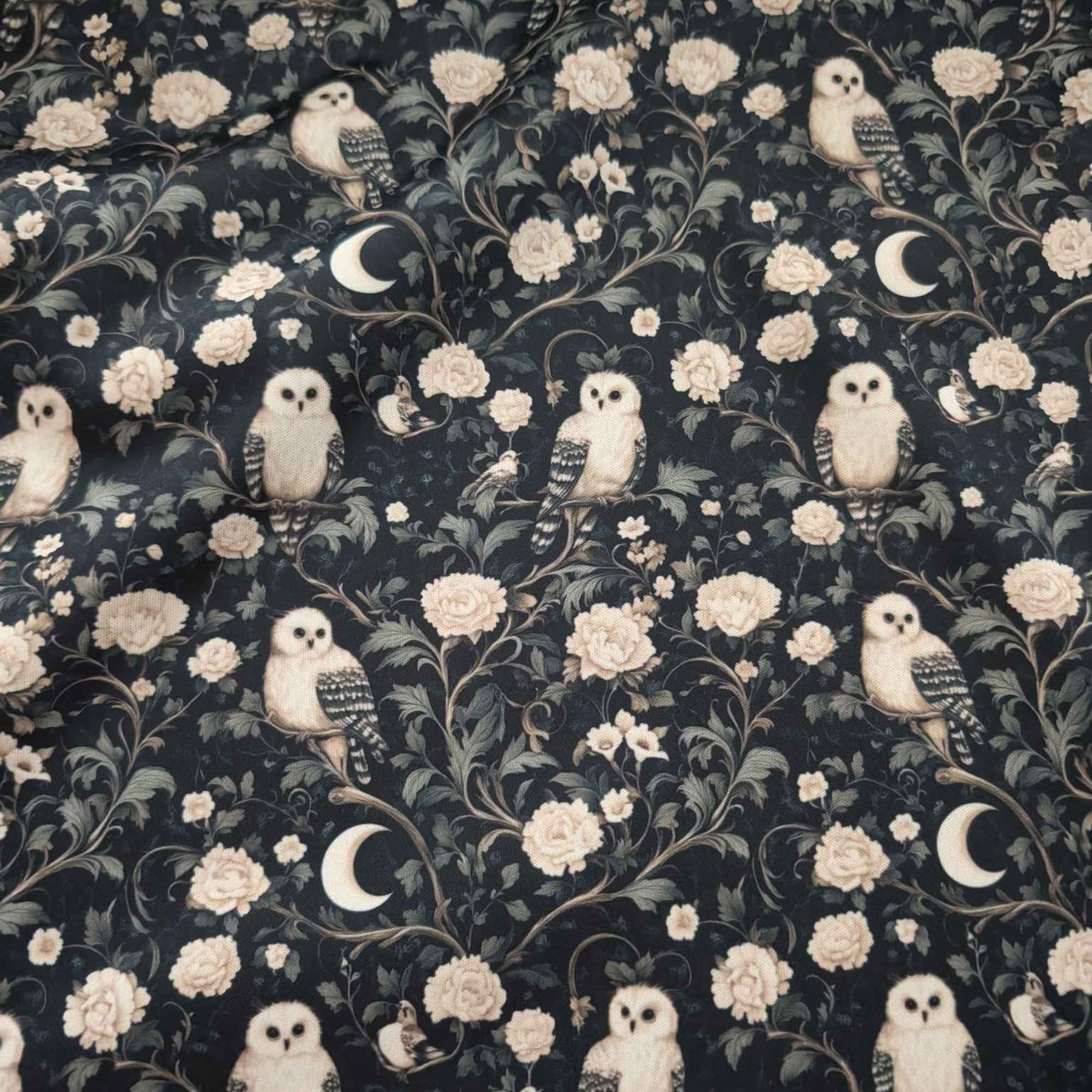 Moonlit Owl Garden exclusive waterproof PUL fabric with ivory owls, cream roses and crescent moons on a dark botanical background