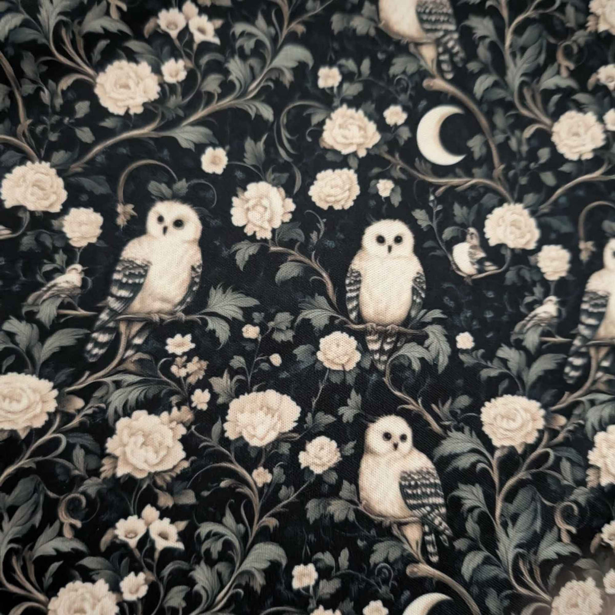 Moonlit Owl Garden exclusive waterproof PUL fabric with ivory owls, cream roses and crescent moons on a dark botanical background