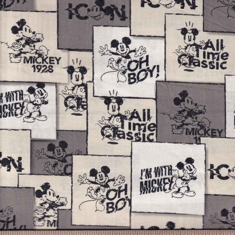 Vintage Mickey Mouse comic block cotton fabric in black cream and grey by Springs Creative CP80474