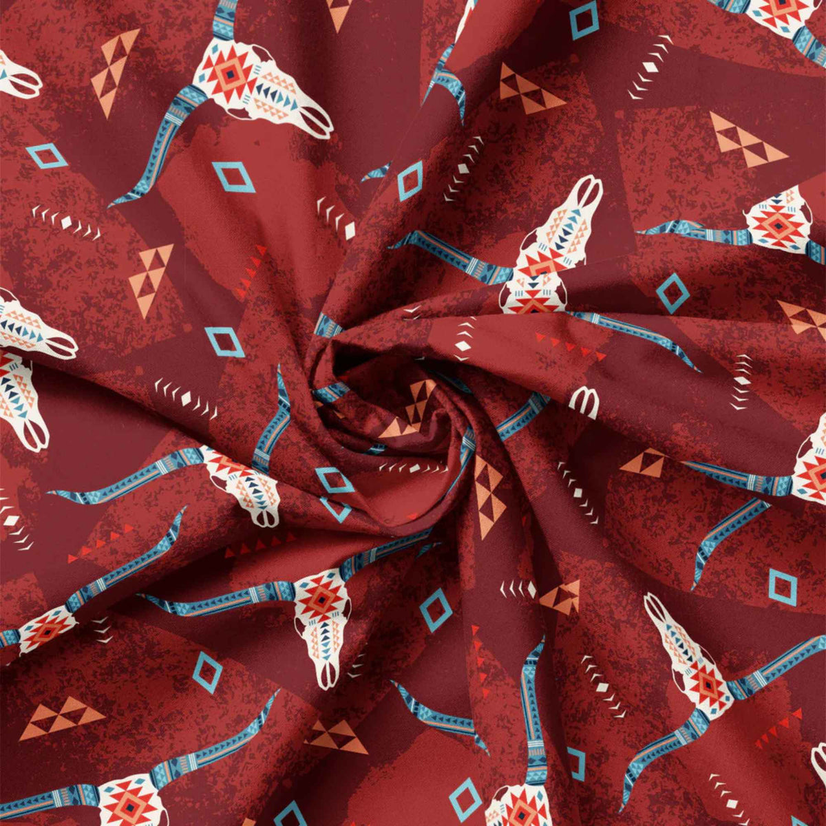 “Rust-colored cotton fabric with Southwestern longhorn skull motifs and tribal geometric accents.”