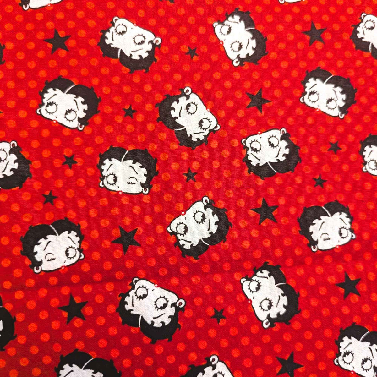 Betty Boop scattered with multi black stars and polka dots