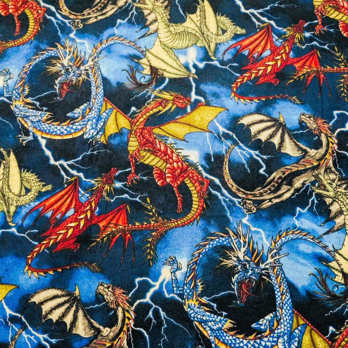 Colorful Dragons Cotton Flannel – Fantasy Creatures on Lightning Sky