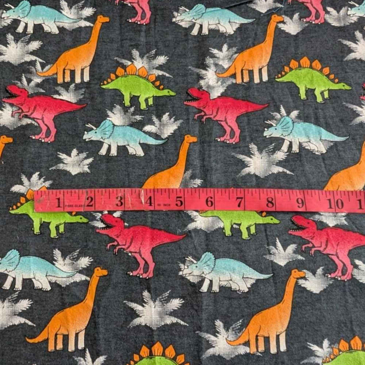 Dinosaur Cotton Flannel – Multicolor Dinosaurs on Charcoal