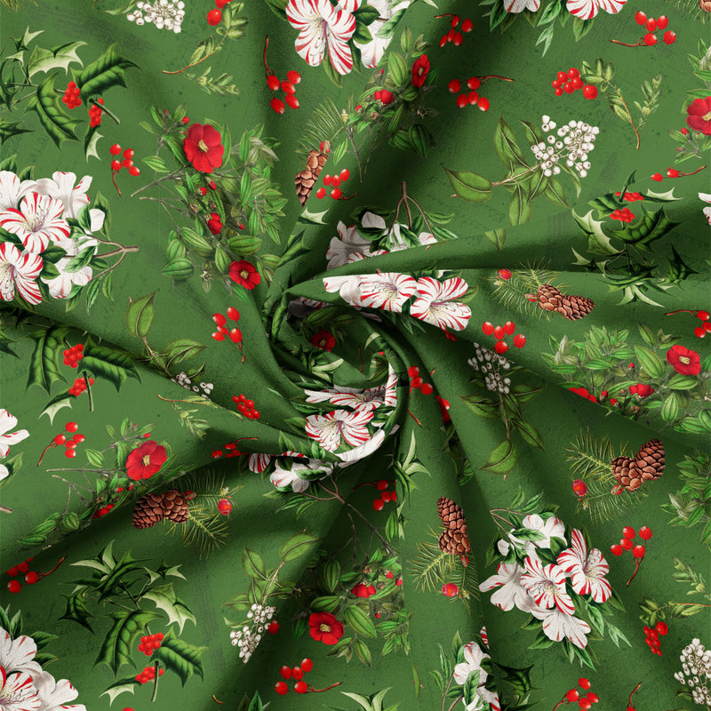 Detail view of Joy to the World Holiday Botanicals on Green quilting cotton showing print scale and drape.