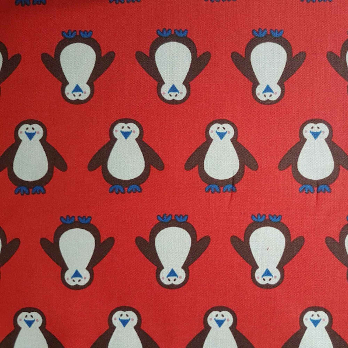 Novelty Penguin on Red Cotton Fabric