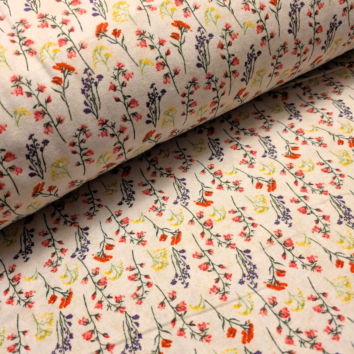 108 inch wide brushed cotton flannel wideback with wildflower print on cream background for seamless quilt backing