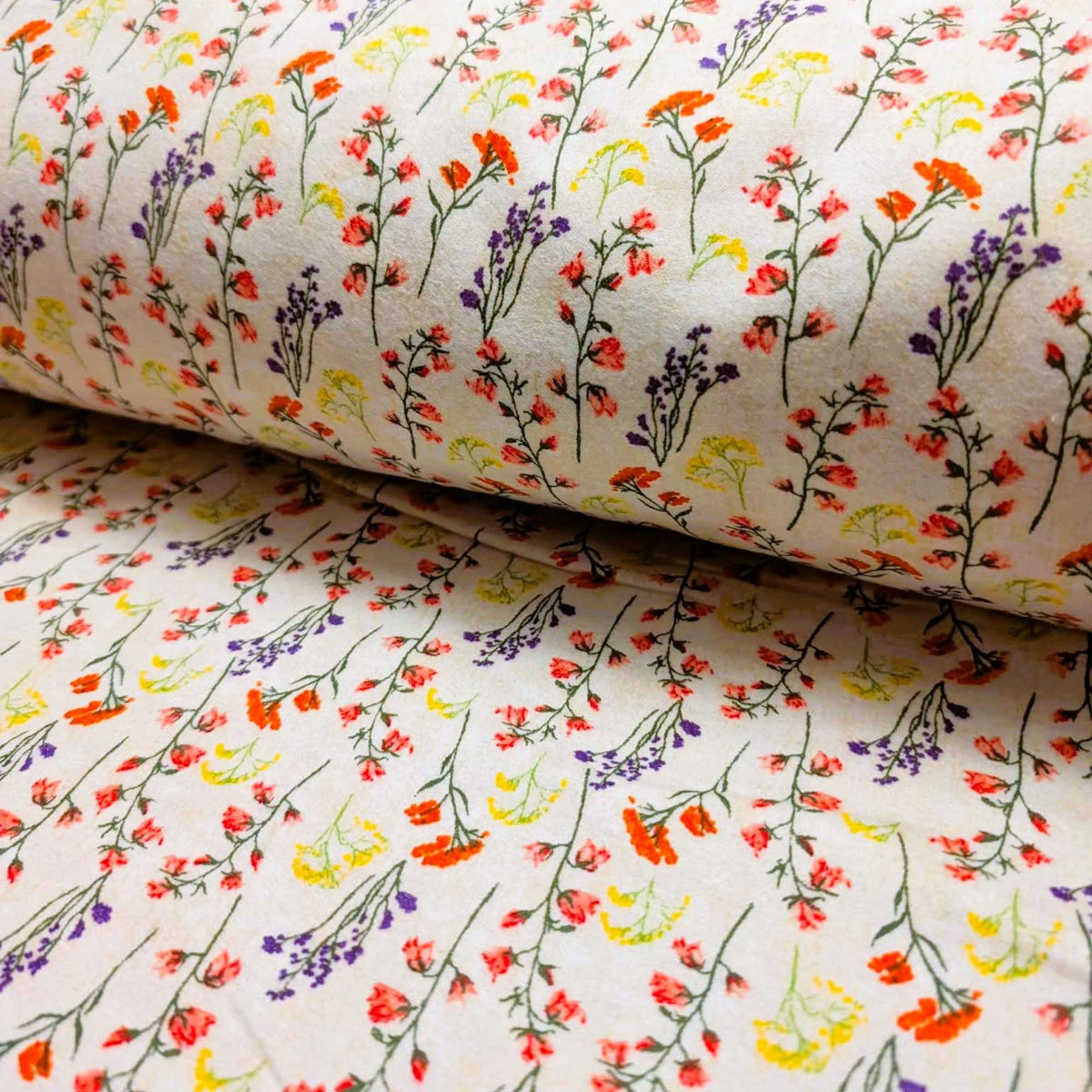 108 inch wide brushed cotton flannel wideback with wildflower print on cream background for seamless quilt backing