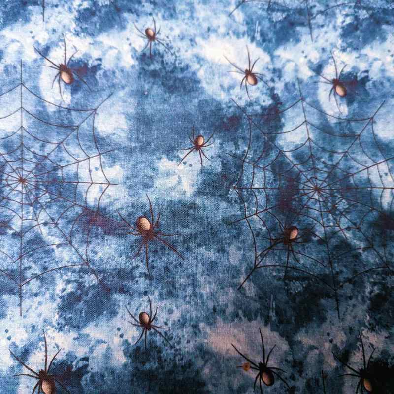 Black Spider and spiderweb on Blue cotton