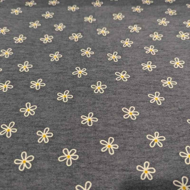 Daisy Flower FLANNEL Fabric on a Blue Denim Background