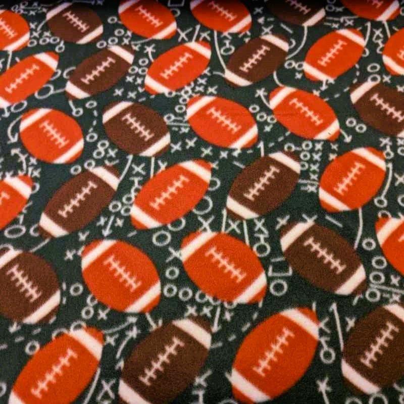 Footballs on Green Anti-Pill Polar Fleece