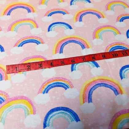 Rainbow and Clouds FLANNEL fabric on Pink | Fabric Design Treasures