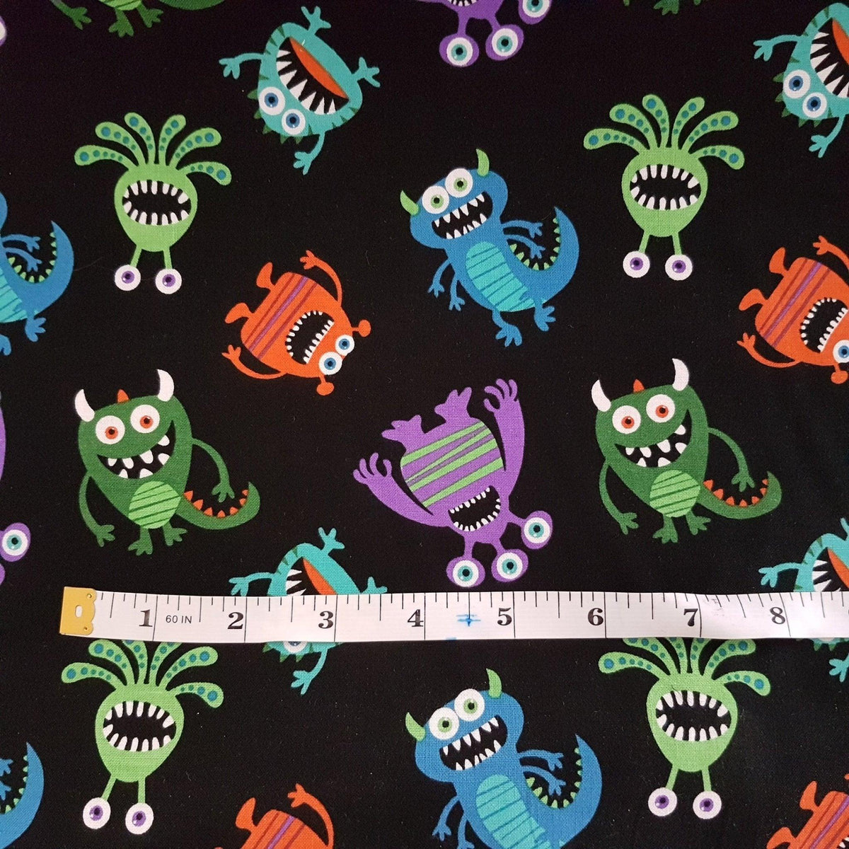 Tossed Doodle Monster Fabric on Black | Fabric Design Treasures