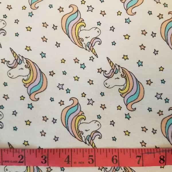 Unicorn Flannel Fabric on Cream | Fabric Design Treasures